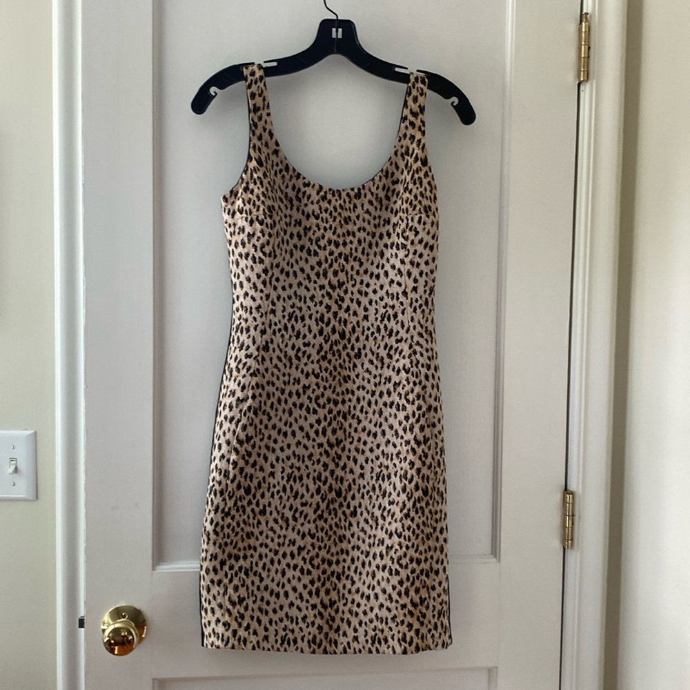 DVF fitted leopard print mini dress, size 4. Excellent used condition.